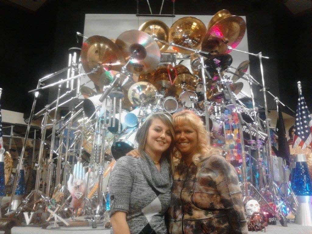 A real photograph taken in front of the enormous drum set after the event